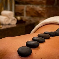Stones placed along the spine for hot stone massage