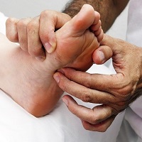 Foot reflexology treatment