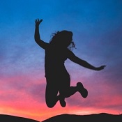 Silhouette of a person jumping in the air