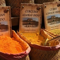 Sacks containing powdered turmeric and saffron 