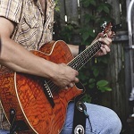 Man playing a guitar