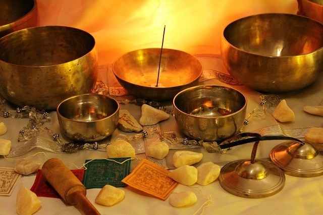 Variety of sound bathing instruments including singing bowls and chimes