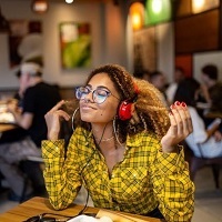 Smiling woman wearing headphones