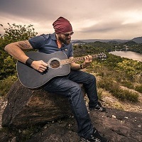 Man playing the guitar