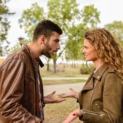 Couple arguing exhibiting negative energy